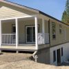 How do modular homes differ from houses built on-site?